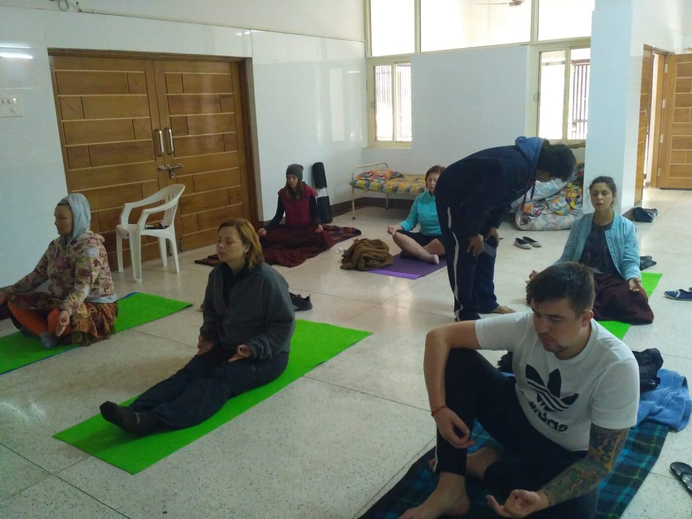 Acharye Rajeev teaching a group
